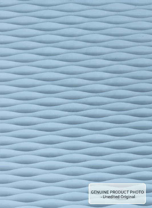 Close-up of a textured blue surface with wavy patterns