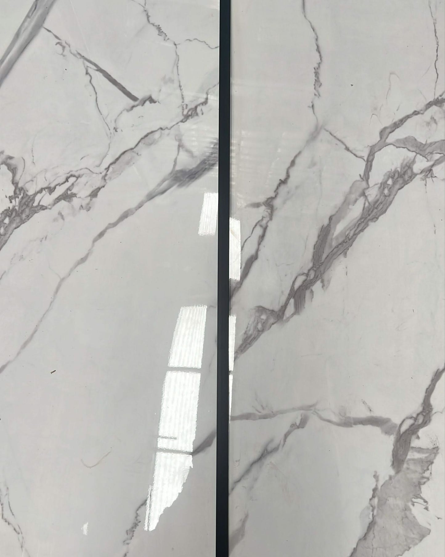 Black internal marble cladding joint for connecting two marble sheets, 3 meters long, by Clads Australia.