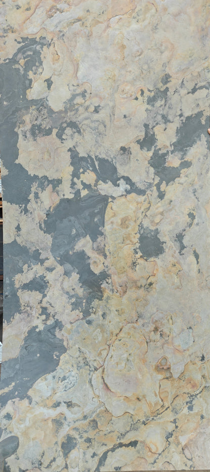 Large Thin Stone Cladding T301 by Clads Australia, showcasing textured natural stone panels in a neutral color.