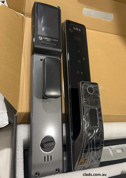 Grey and black Cladding Supplies of Australia Model 16 smart door lock mounted on a door for secure access.