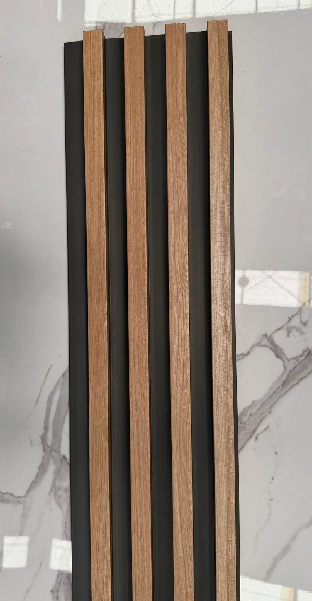 Internal teak half cladding with four slats, 3 meters long, by Cladding Supplies of Australia, showcasing the natural wood finish.