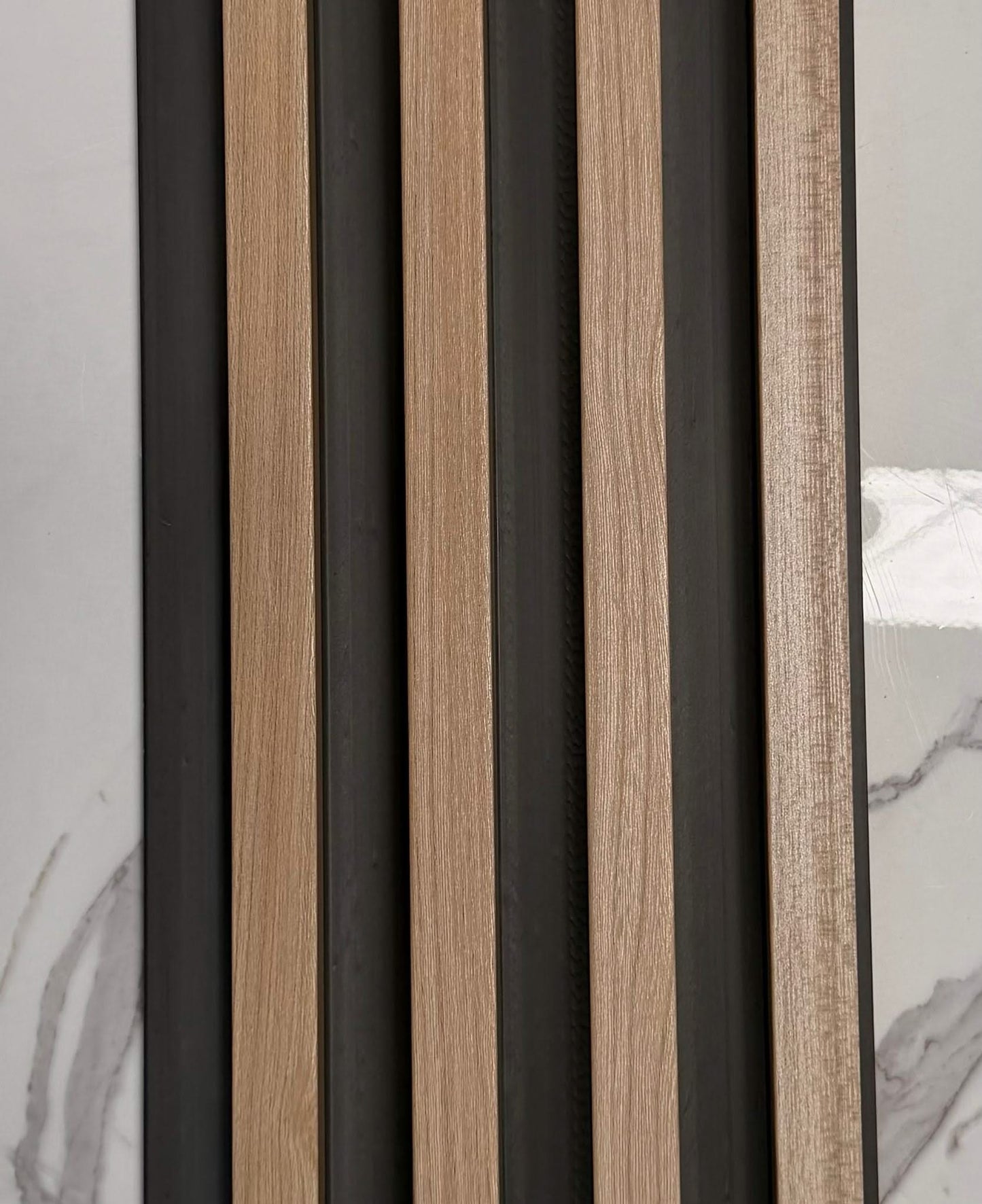 Internal teak half cladding with 4 slats, 3 meters long, showcasing natural wood grain for interior wall decoration.