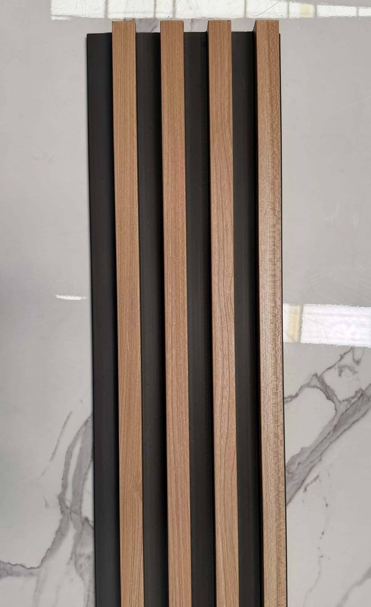 Internal half cladding in teak with four slats, 3 meters long, by Cladding Supplies of Australia, showcasing natural teak wood finish.