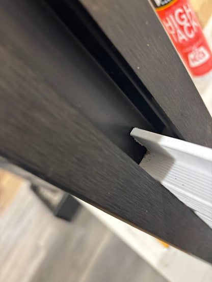 Horizontal WPC cladding post and accessories from Cladding Supplies of Australia, showing a close-up of the textured wood-look surface and fittings.
