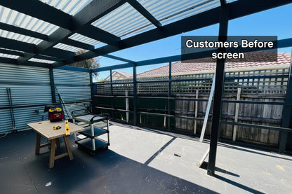 Charcoal grey external half cladding with four horizontal slats, installed on a building exterior for modern, stylish weather protection.