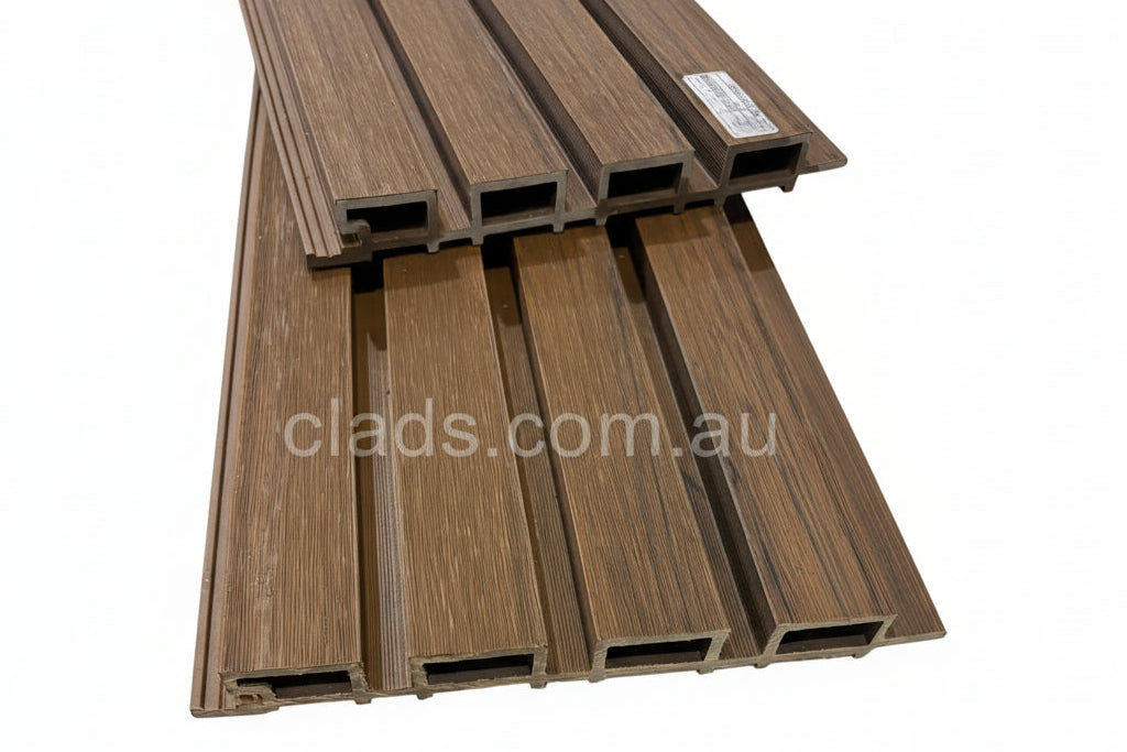 External walnut cladding with four slats from Clads Australia, showcasing natural wood grain and modern exterior design.