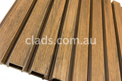 External walnut cladding with four slats by Clads Australia, showcasing the natural wood grain and sleek exterior design.