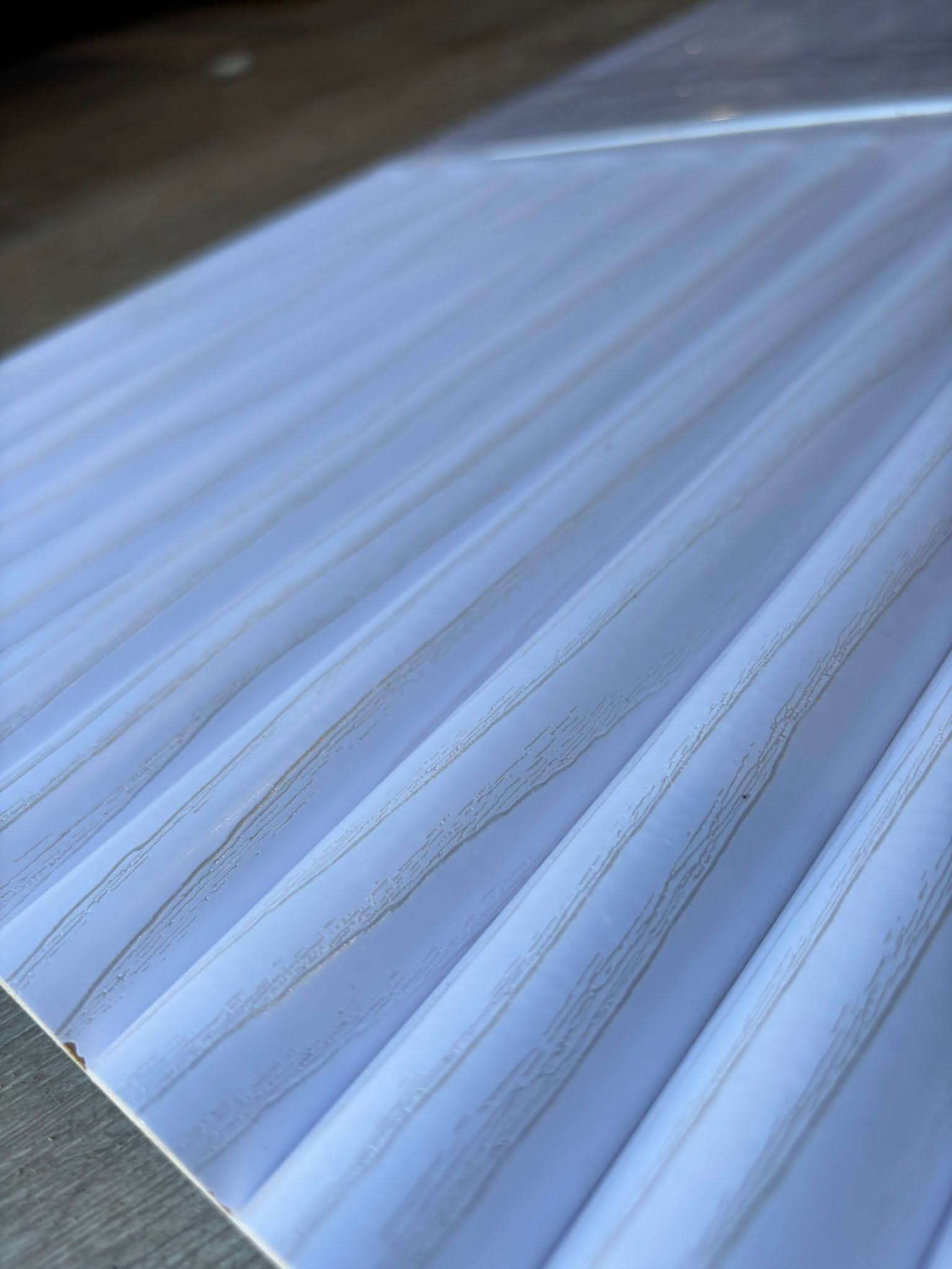 White flexible MDF half round internal cladding panel from Clads Australia, 2.7 meters long, showing smooth curved surface and installation details.