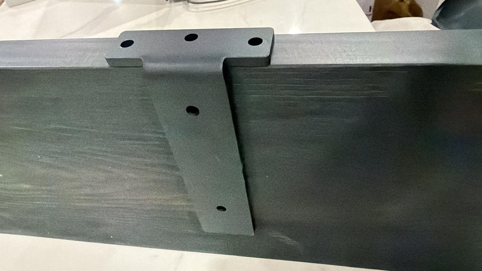 Black wooden floating shelves from Cladding Supplies of Australia mounted on a wall for modern interior storage.
