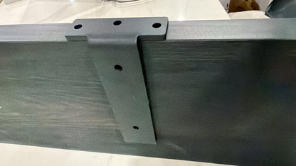 Black wooden floating shelves from Cladding Supplies of Australia mounted on a wall for modern interior storage.