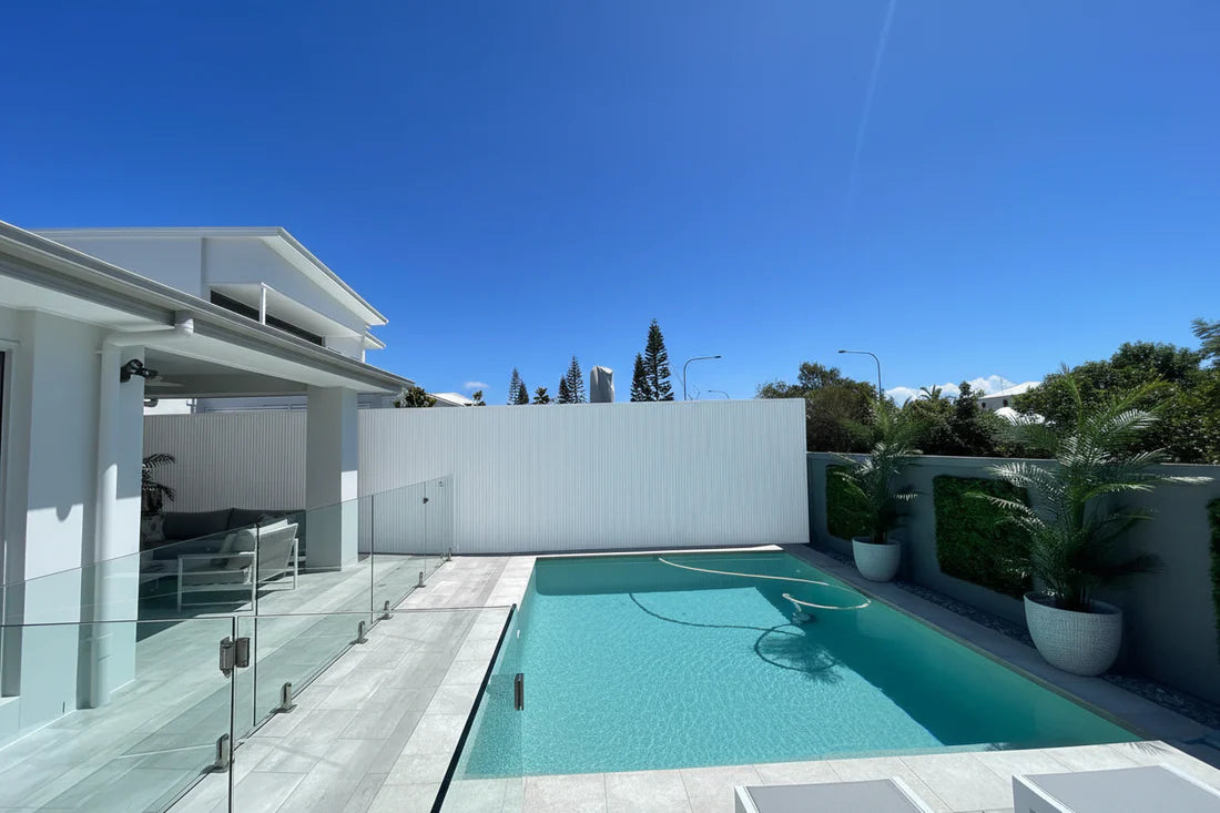 White external cladding with four slats, 5.8 meters long, by Clads Australia, showcasing a modern and sleek weather-resistant design.