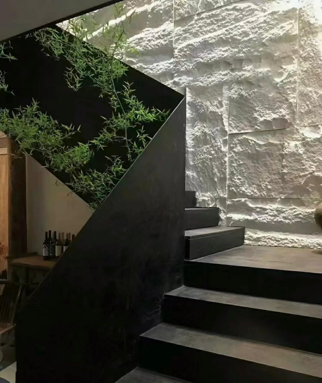 Fake stone cladding in charcoal color by Clads Australia, showing textured stone surface on a 600x1200mm panel.